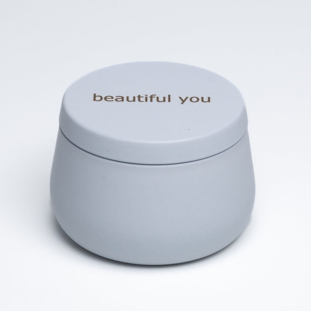 small white candle tin with the words beautiful you